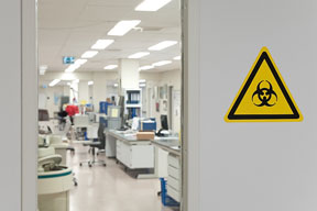 biohazard sign at the entrance to a microbiology lab